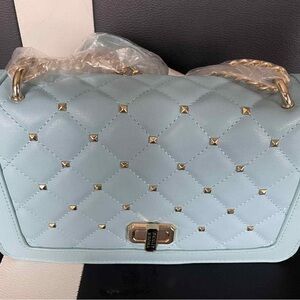 Chic Light Blue Quilted Shoulder Bag with Gold Details